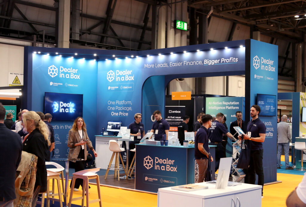 Evolution Funding and Click Dealer showcasing Dealer in a Box at Automotive Management Live 2025